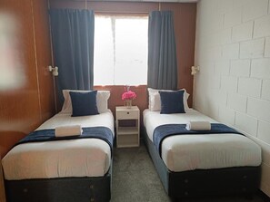 2 habitaciones, tabla de planchar con plancha y wifi gratis 
