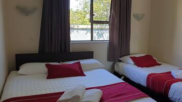 Family Apartment, 1 Bedroom | Desk, laptop workspace, iron/ironing board, free cribs/infant beds