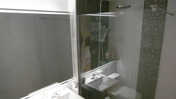 Shower, free toiletries, hair dryer, slippers