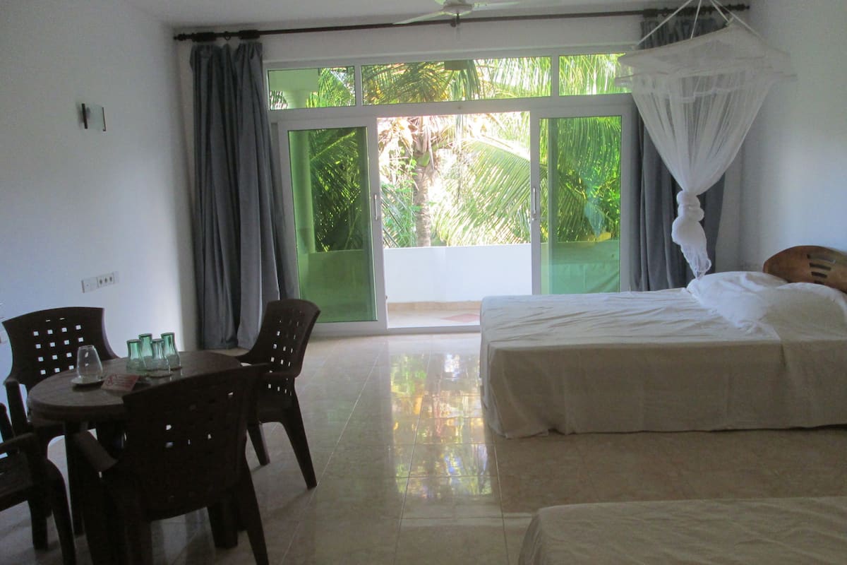 Family Room, Balcony | Blackout drapes, cribs/infant beds, free WiFi, bed sheets