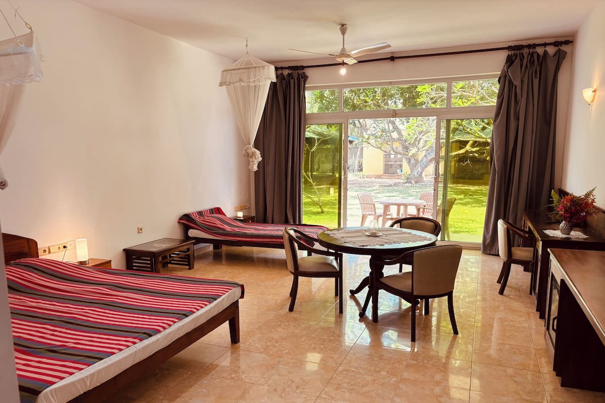 Deluxe Triple Room, Terrace | Blackout curtains, cots/infant beds, free WiFi, bed sheets