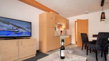 Apartment, 2 Bedrooms, Balcony, Mountain View (Alpenheimat) | Living area | 37-inch flat-screen TV with satellite channels, TV, DVD player