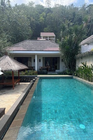 Deluxe Room, Pool View | View from room - Senggigi Cottages Lombok (Senggigi)