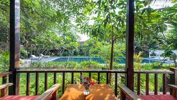 Premium Double Room, Pool View | Minibar, in-room safe, desk, free WiFi