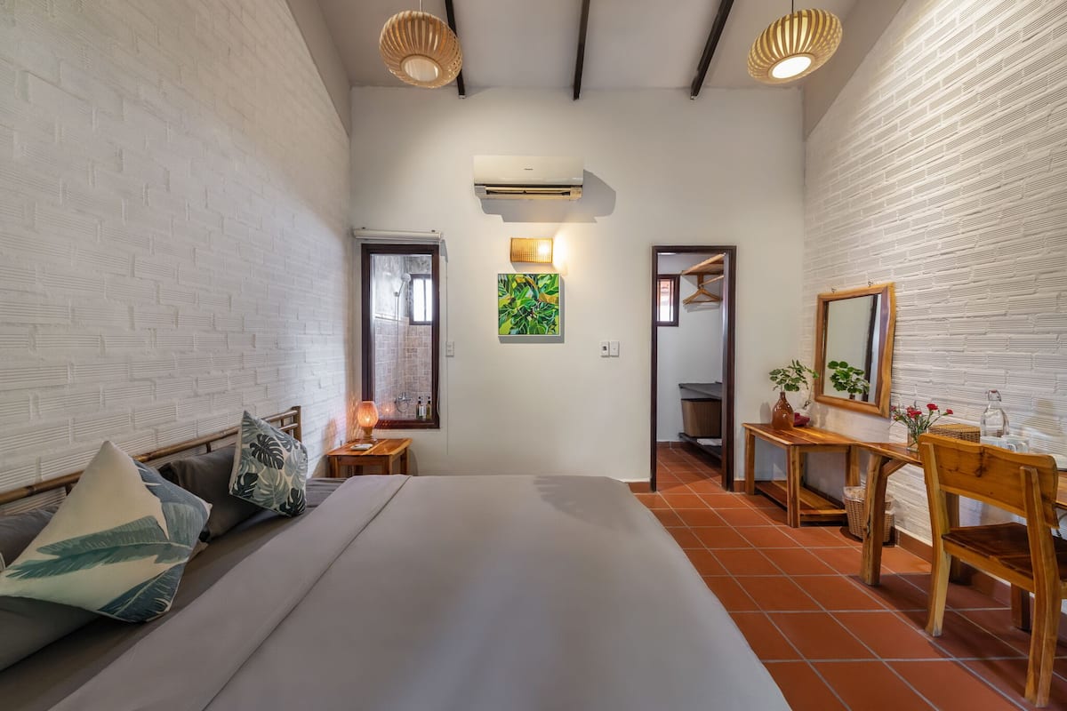 Phòng đôi Deluxe, quang cảnh vườn | Minibar, két bảo mật tại phòng, bàn 