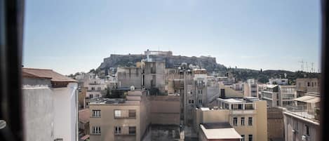 Chambre Simple Économique, 1 lit une place, salle de bains commune | Bureau, chambres insonorisées, fer et planche à repasser