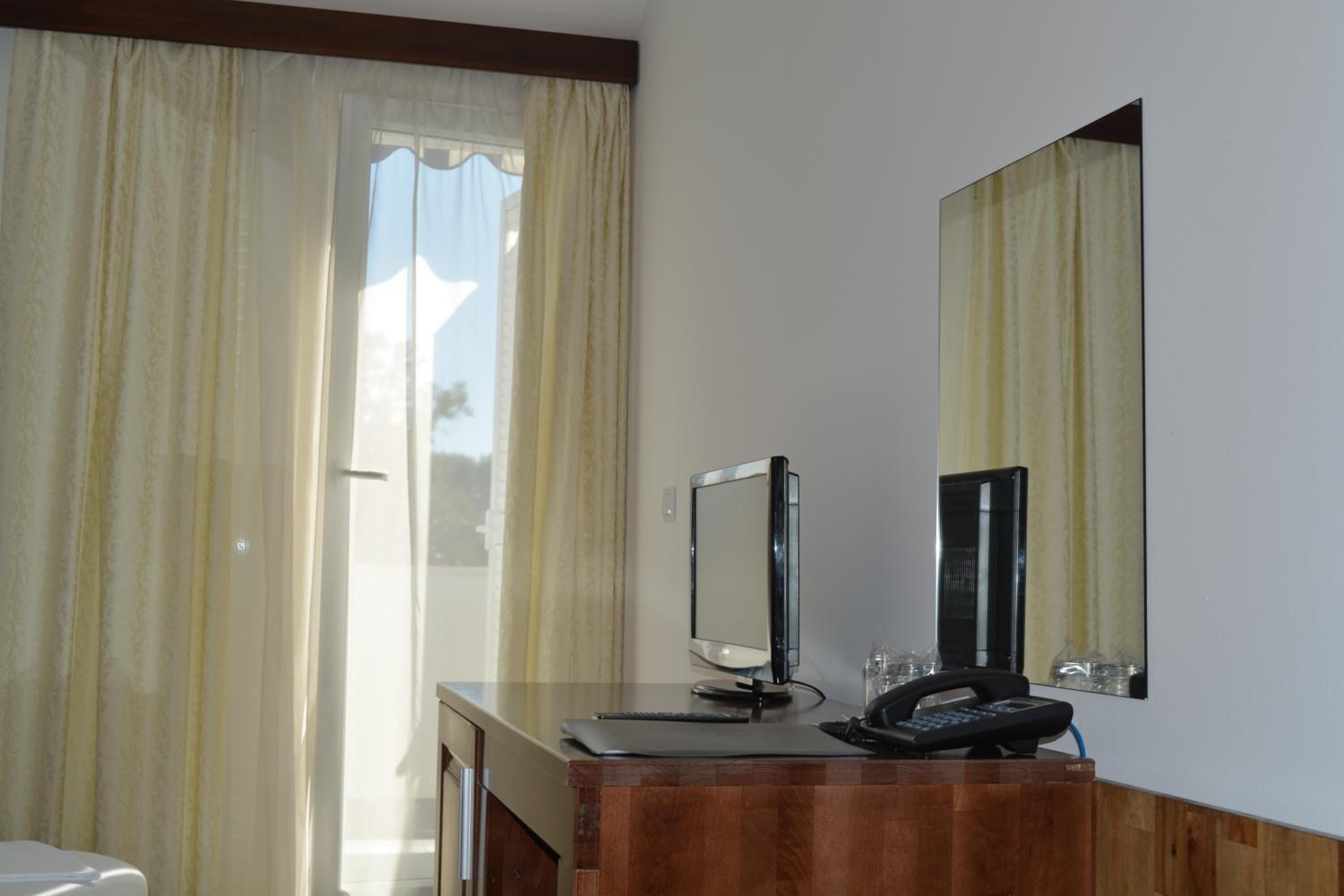 minibar, in-room safe, desk, iron/ironing board