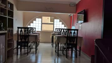 Breakfast, lunch served; international cuisine, al fresco dining
