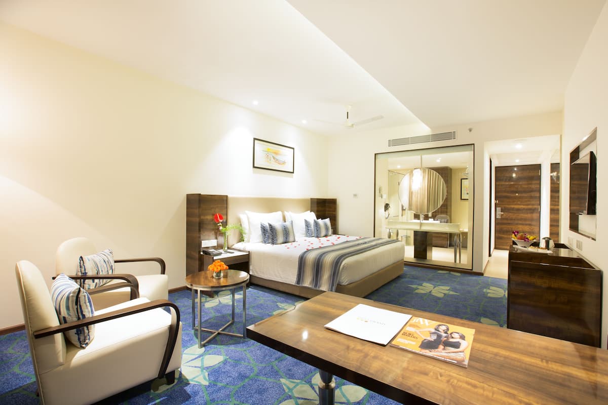 Executive kamer | 1 slaapkamer, een minibar, een kluis op de kamer, een bureau
