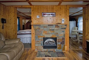 Cottage, 1 Bedroom | Living area | TV, fireplace