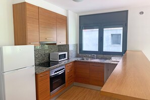 Full-sized fridge, microwave, stovetop, espresso maker