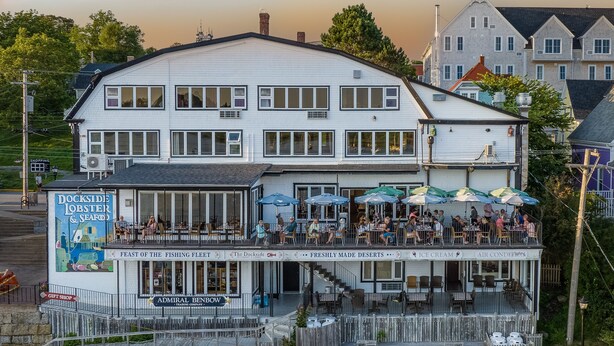 A waterfront restaurant with outdoor seating and a gift shop. - The Dockside Inn & Restaurant (Lunenburg)