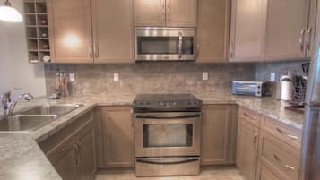 Premium Suite, 2 Bedrooms, Kitchen, Lake View | Private kitchen | Full-size fridge, microwave, stovetop, dishwasher