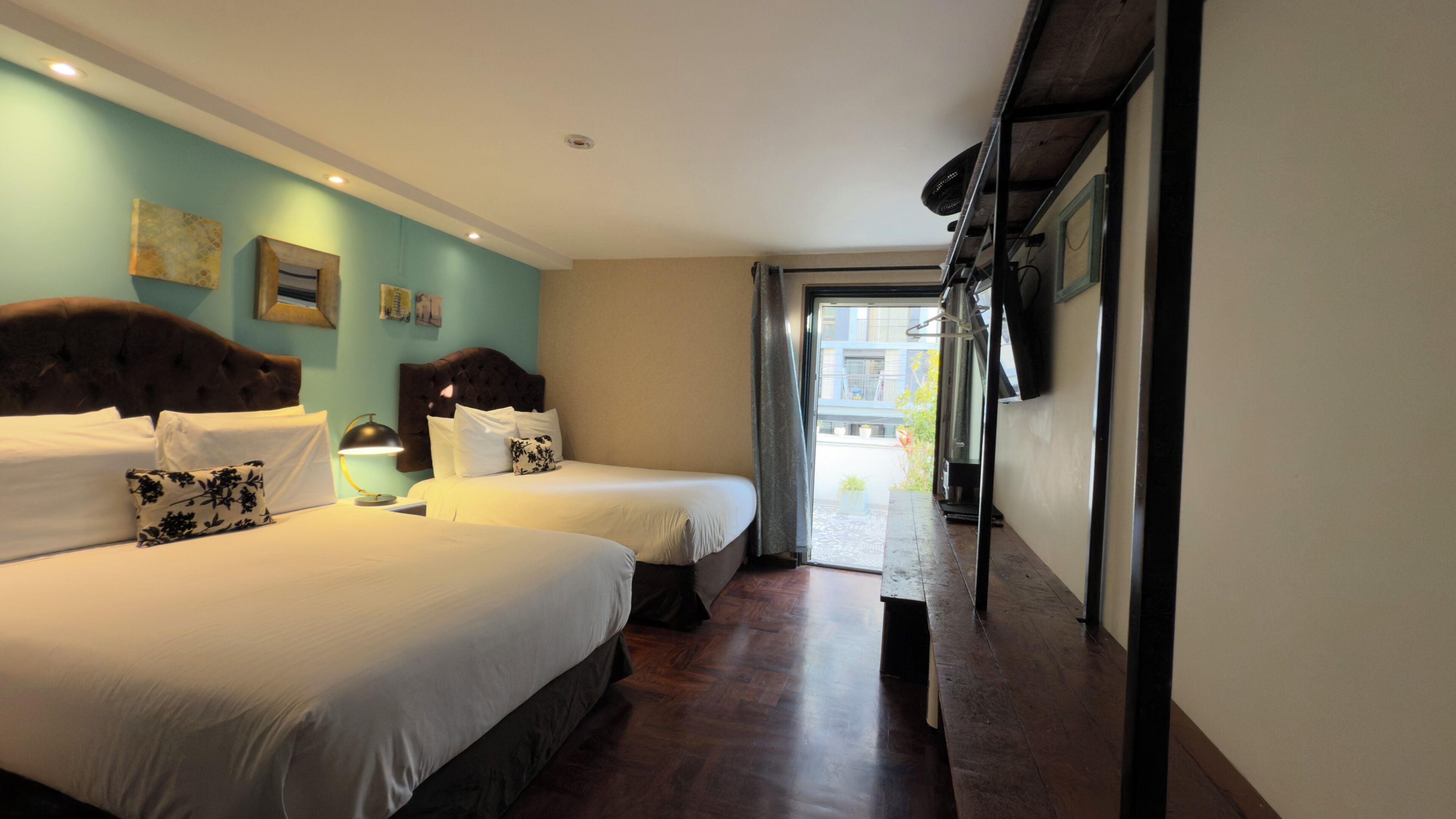Superior Quadruple Room, Private Bathroom | Down duvets, minibar, in-room safe, individually decorated