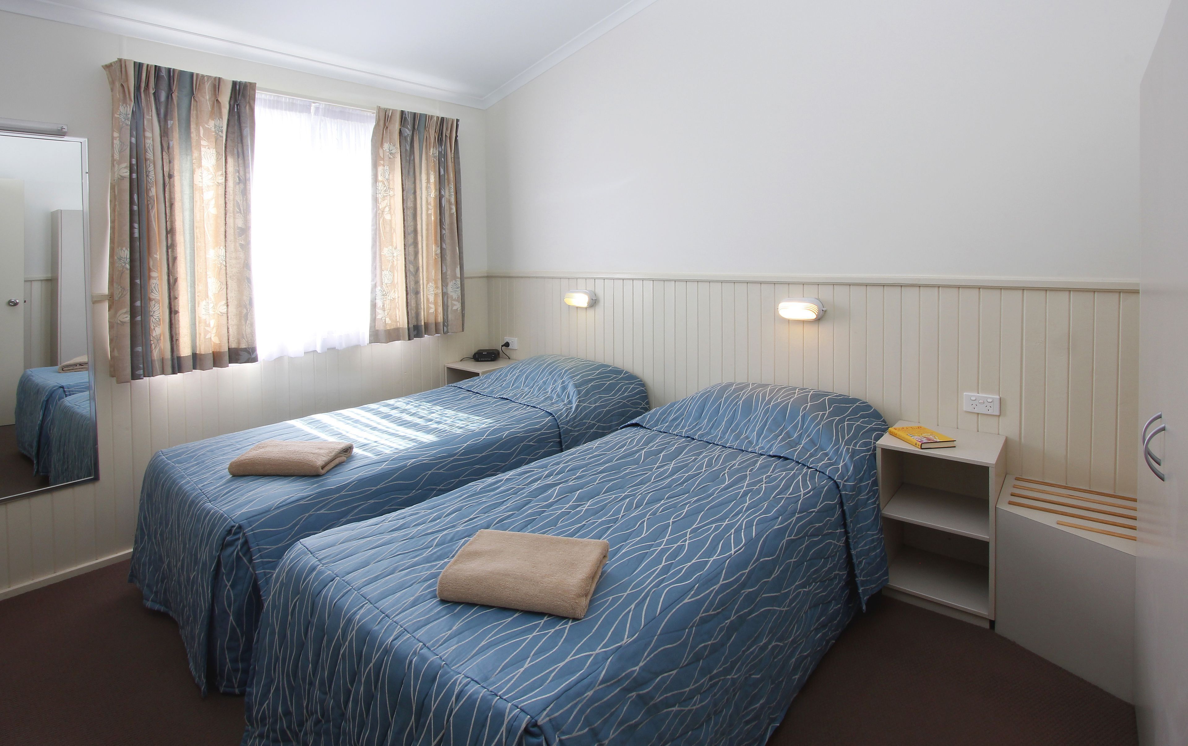 Blackout curtains, iron/ironing board, bed sheets