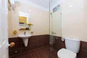 Shower, free toiletries, slippers, towels