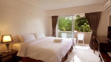 Standard Double Room | Minibar, in-room safe, individually decorated, desk