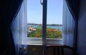 Kamar Quadruple Standar, 2 Tempat Tidur Double | Brankas, meja kerja, dan Wi-Fi gratis