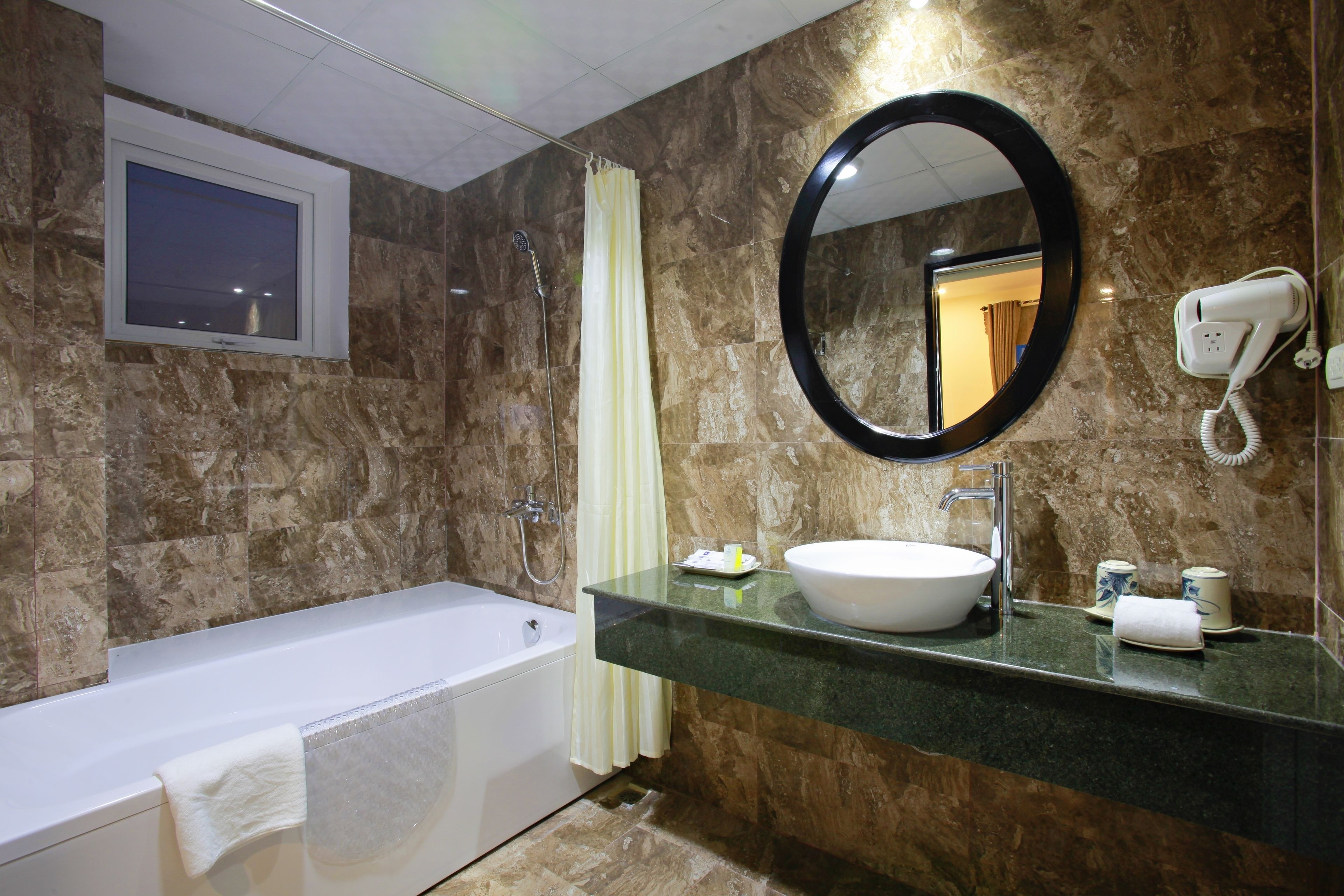 junior double room, balcony, city view | bathroom | shower, designer toiletries, hair dryer, bathrobes