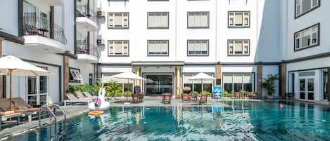 Outdoor pool, pool umbrellas, pool loungers