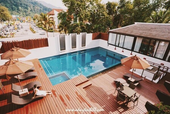 Outdoor pool, sun loungers