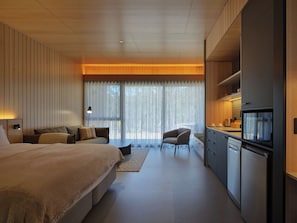 Gordon King Suite Garden View | Living area | 30-inch Smart TV with satellite channels, table tennis