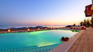 Outdoor pool, pool umbrellas, pool loungers