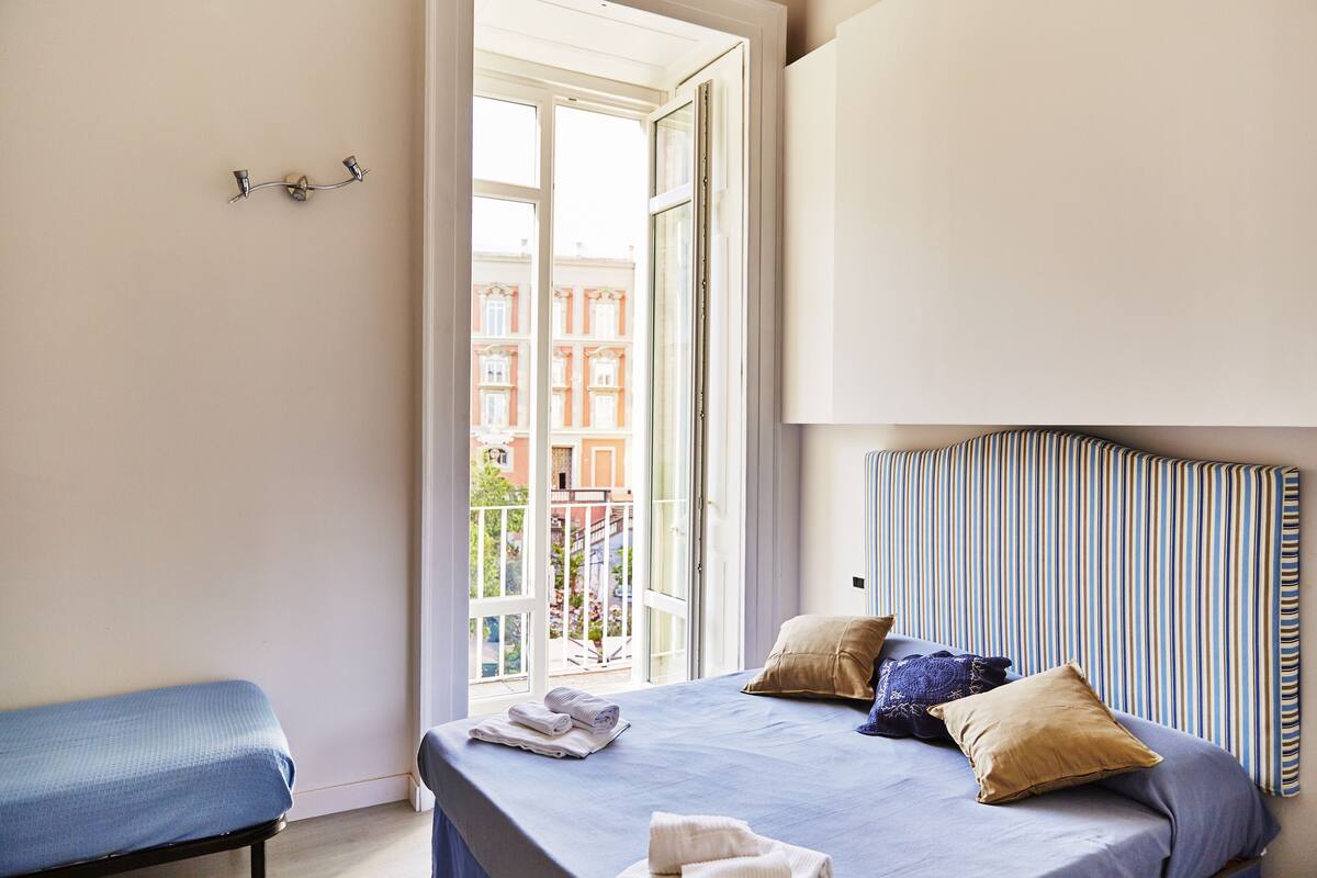 Junior Quadruple Room, City View | Desk, blackout drapes, soundproofing, WiFi (free)