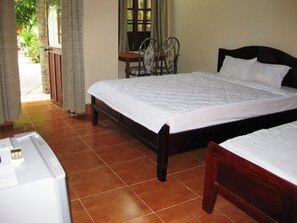 Superior Room, Garden View | Minibar, desk, free WiFi