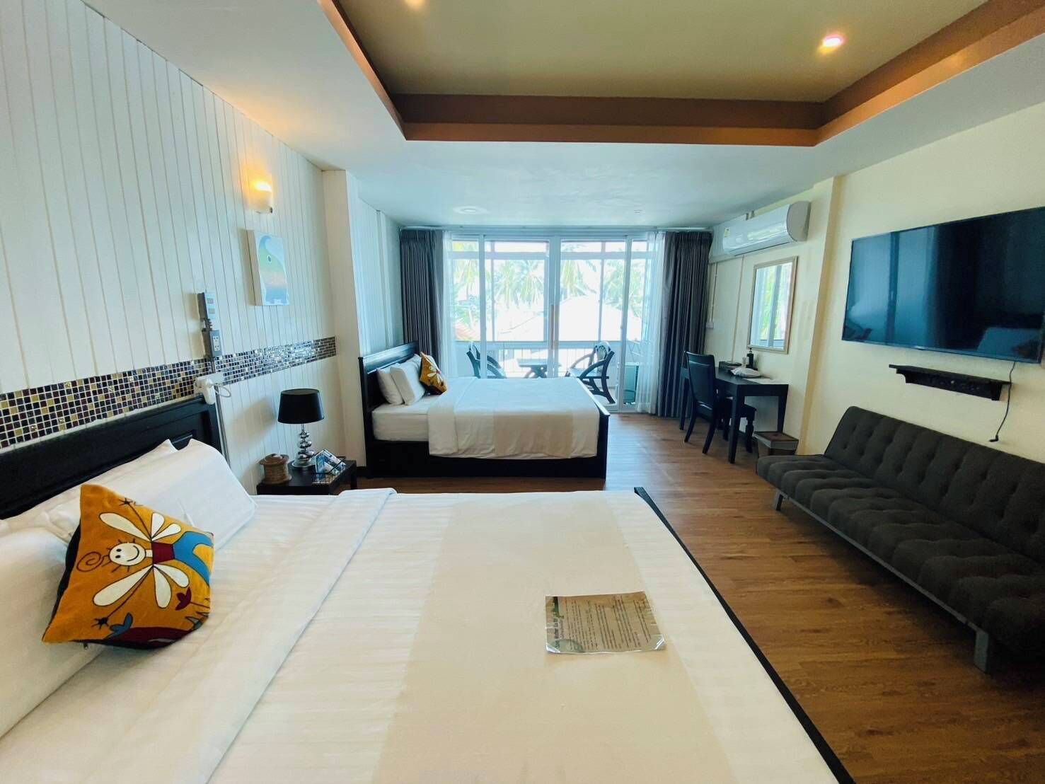 Family Room Seaview | Caja de seguridad en la habitación, cortinas blackout y wifi gratis 