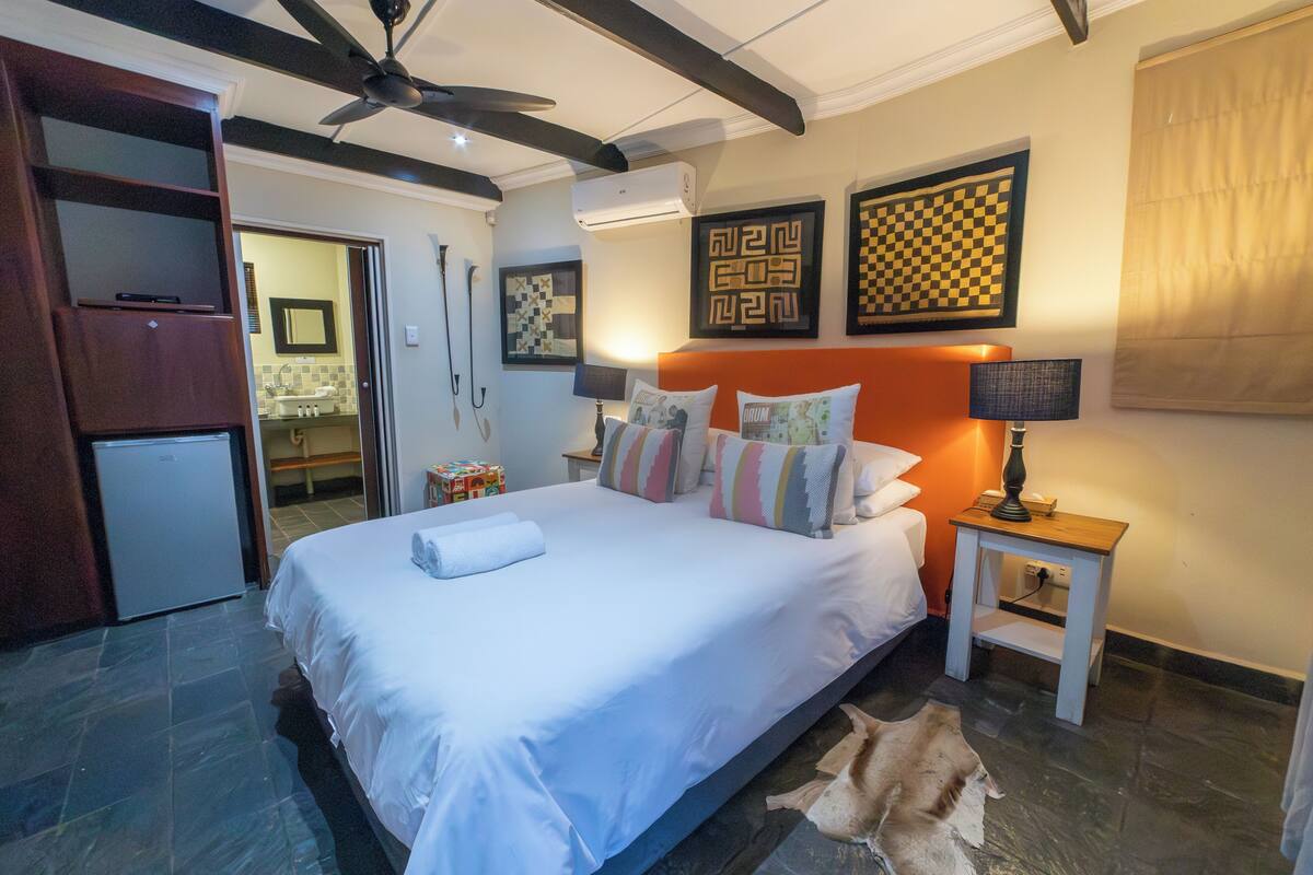 Standard Double Room, 1 Queen Bed, Private Bathroom | In-room safe, desk, WiFi (free), individually decorated