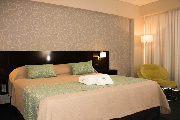 Deluxe Double Room | Minibar, in-room safe, desk, blackout curtains