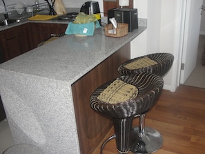 Enjoy cooking in this well-equipped kitchen with an island and ample counter space.