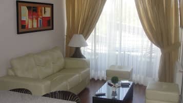 Family Apartment, 2 Bedrooms | Living area | LCD TV