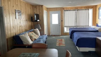 Deluxe Studio Suite, 2 Queen Beds | Living area | TV