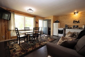 Suite, Multiple Beds | Living area | TV - Dixon Lake Resort (Gaylord)