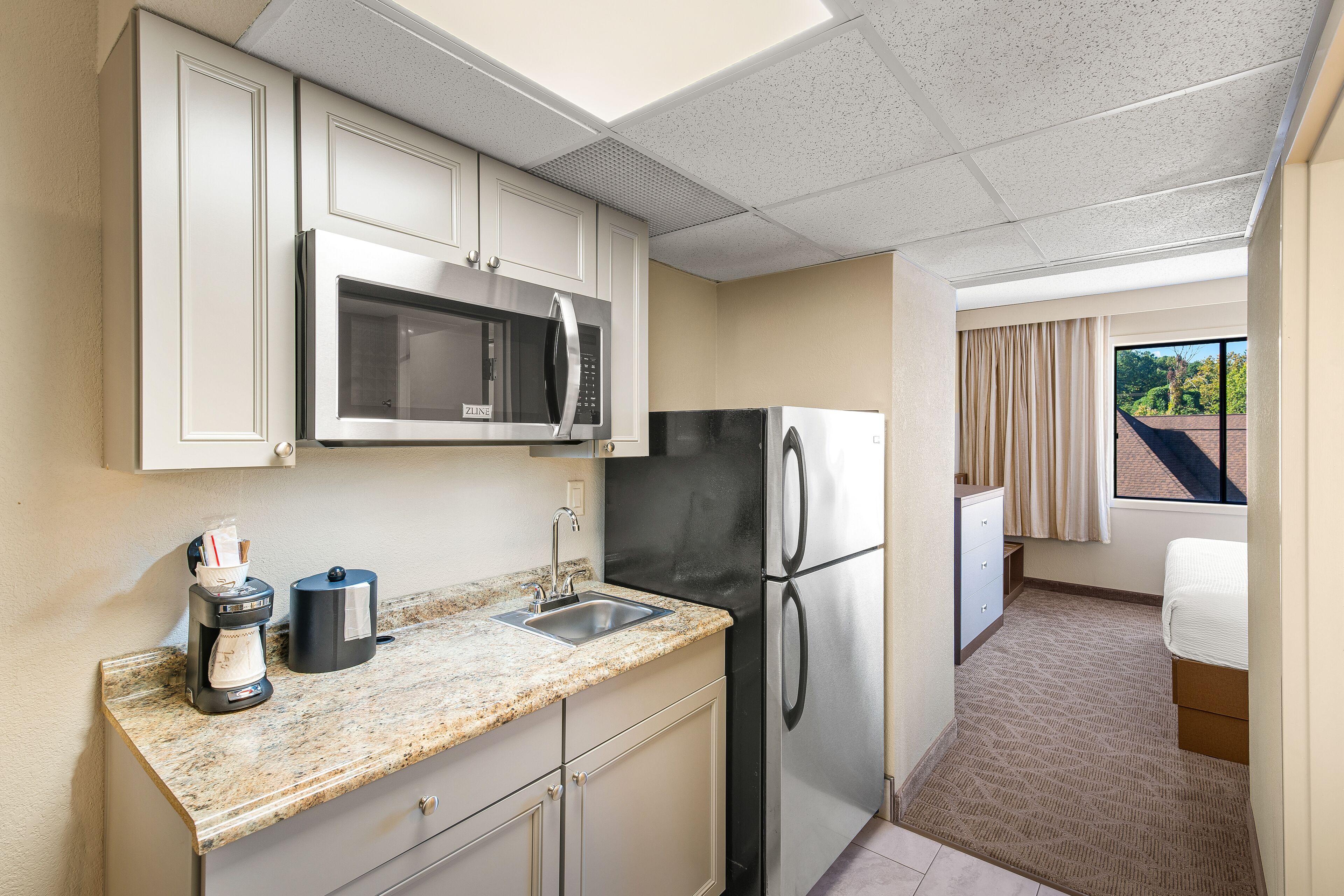 superior single room, 1 king bed with sofa bed | private kitchen | fridge, microwave, coffee/tea maker