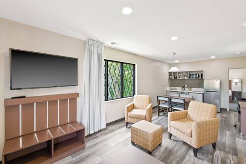 Family Suite, 2 Bedrooms | Desk, laptop workspace, soundproofing, iron/ironing board