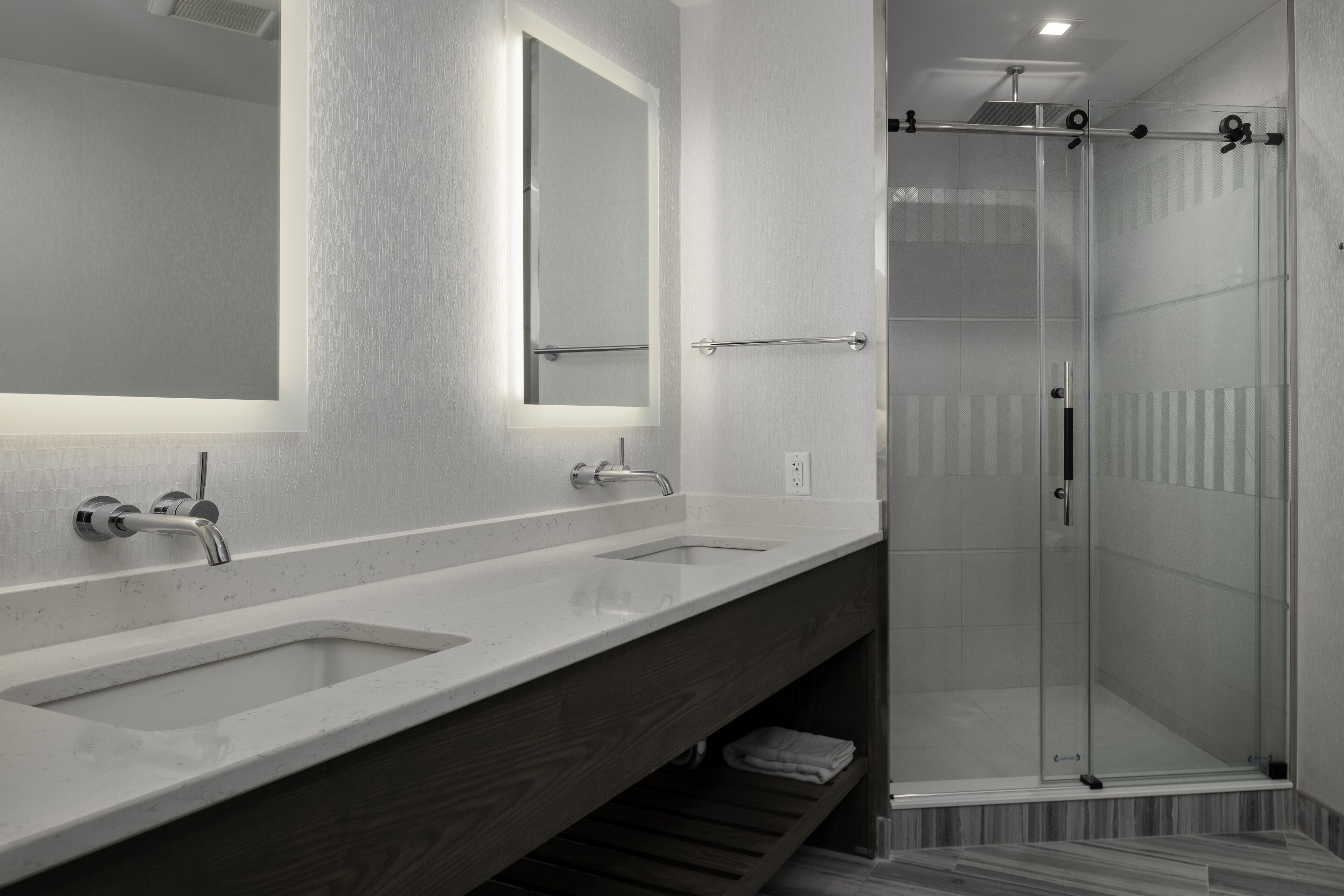 designer toiletries, hair dryer, bathrobes, towels