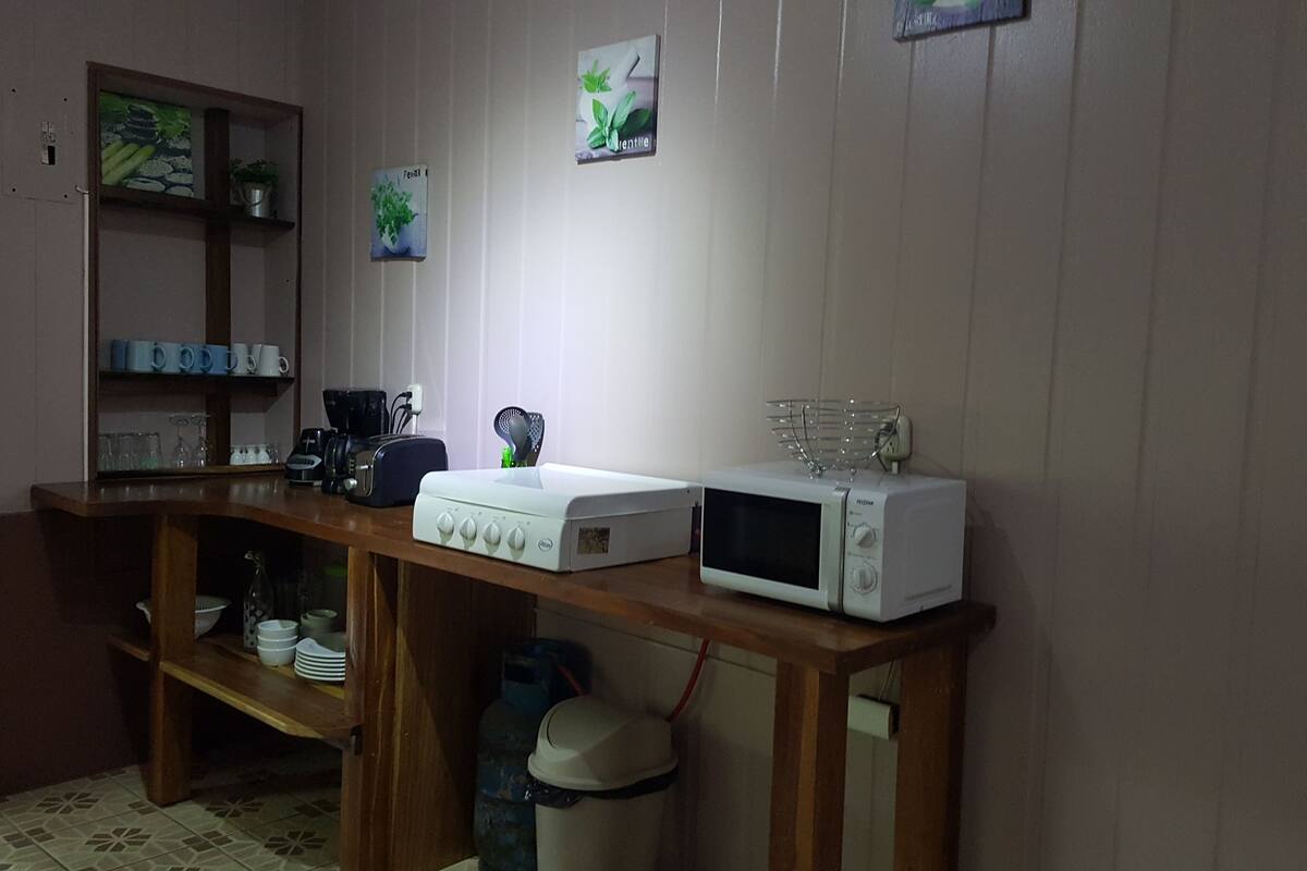 apartment, 2 bedrooms, kitchen, garden area | private kitchen | full-sized fridge, microwave, stovetop, toaster