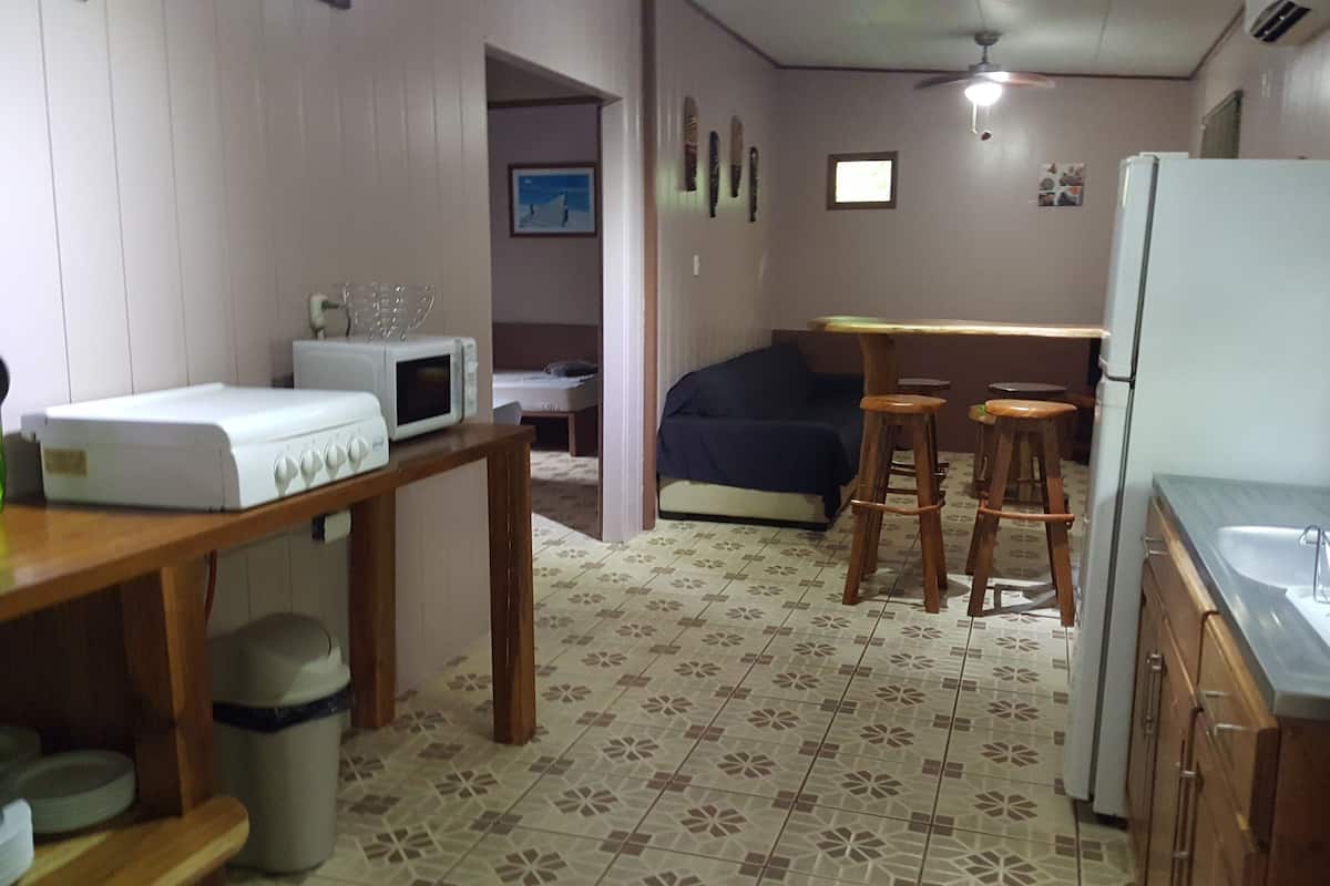 apartment, 2 bedrooms, kitchen, garden area | private kitchen | full-sized fridge, microwave, stovetop, toaster