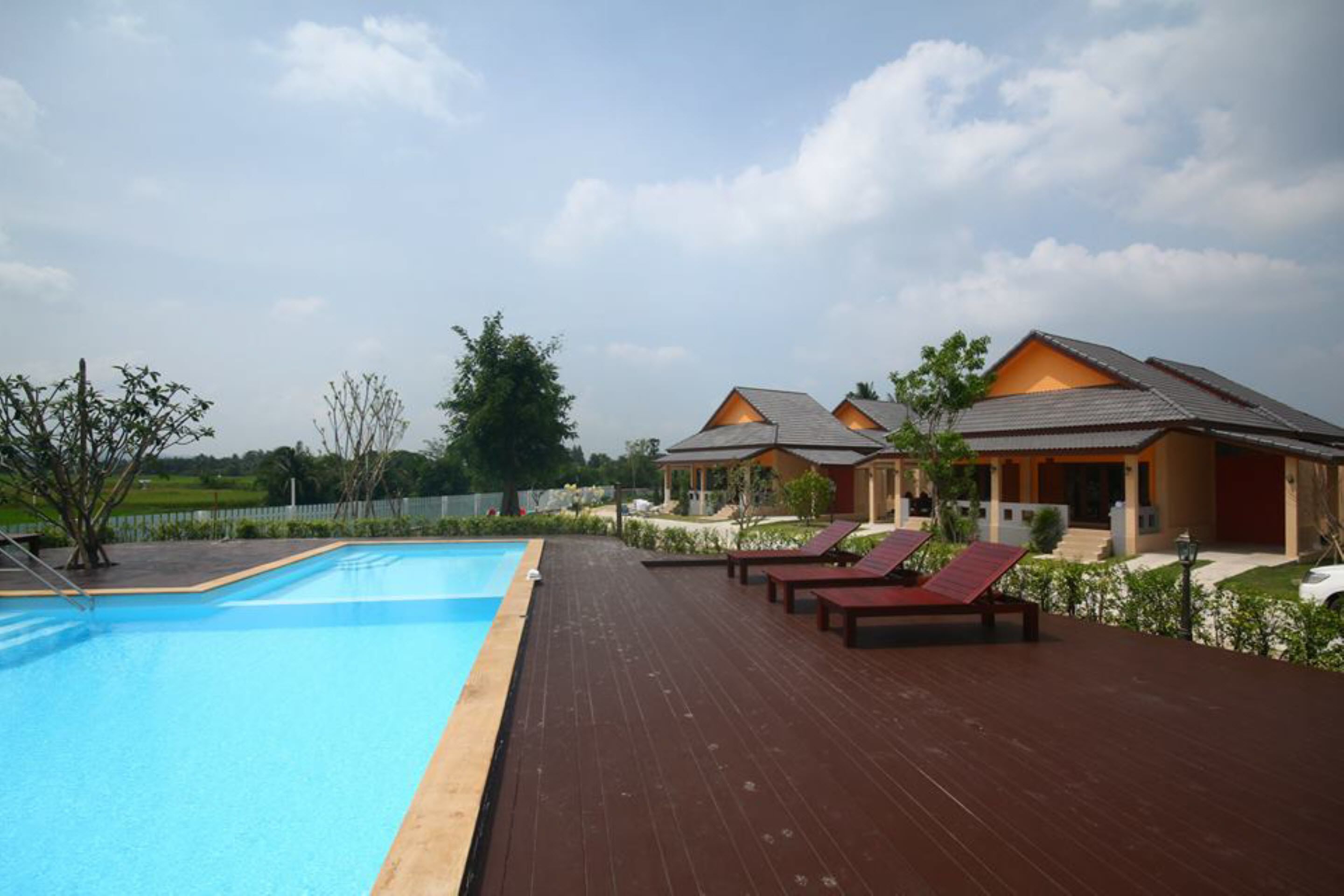 outdoor pool, pool umbrellas, pool loungers