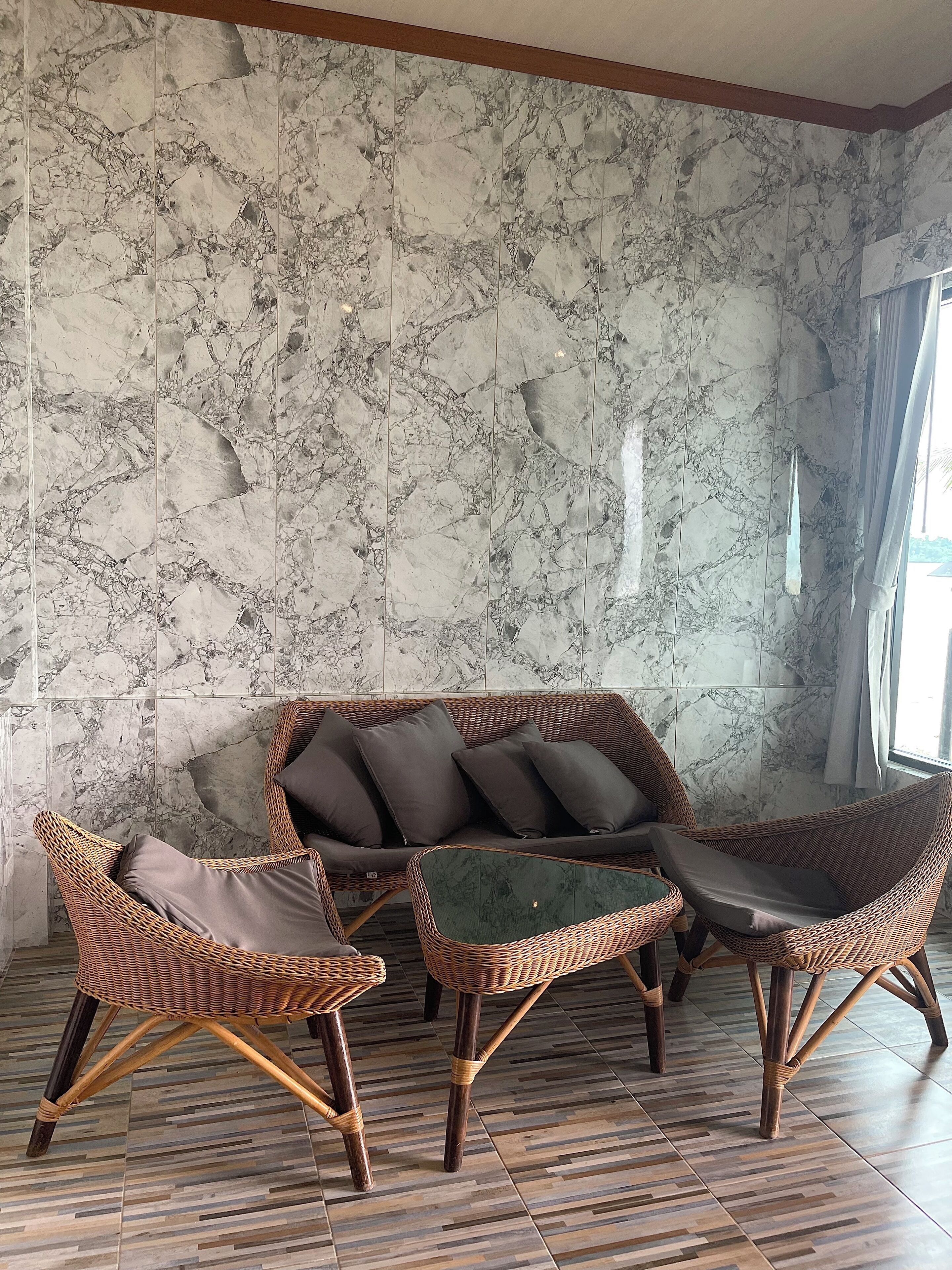 air-con beach front (4 persons) | living area | flat-screen tv