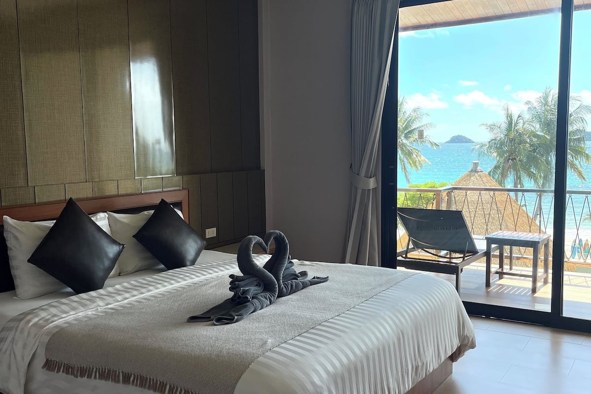 superior building pool view | 1 bedroom, minibar, in-room safe, desk