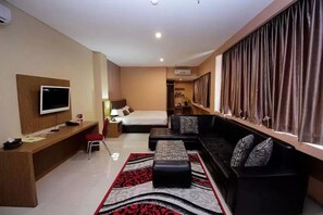 32-inch flat-screen TV with satellite channels, TV