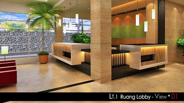 A lobby with a reception desk, a palm tree, and a stone wall.