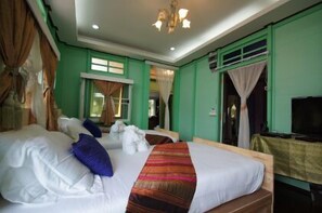 Suite empresarial | Ropa de cama de alta calidad y minibar 