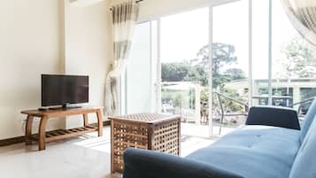 Suite, 1 chambre | Coin séjour