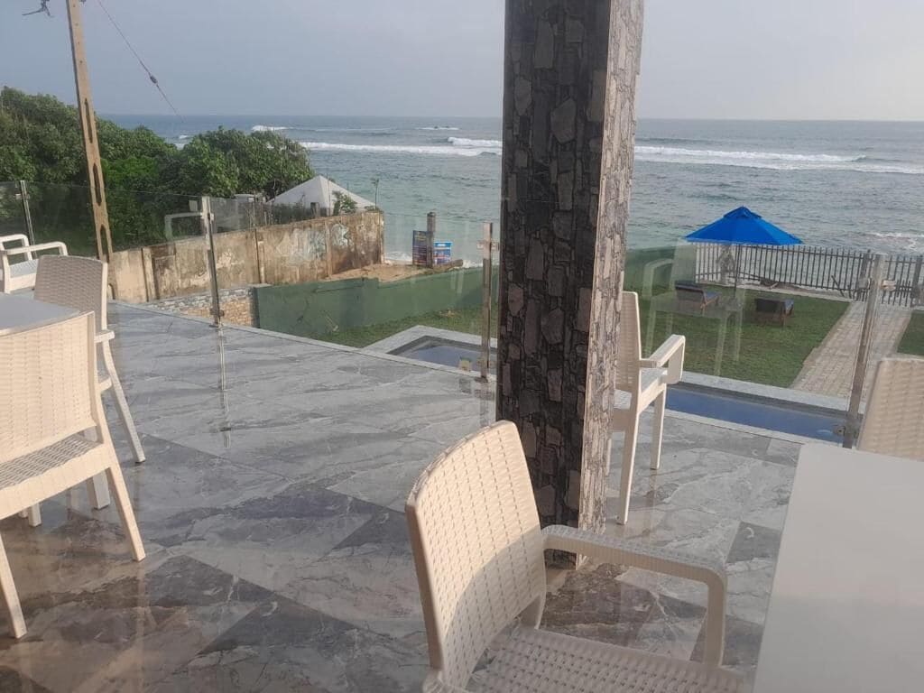 Deluxe Room, Multiple Bedrooms, Beach View, Beachfront | 2 bedrooms, minibar, in-room safe, desk