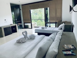 Quarto triplo luxo, 1 quarto, vista para o jardim | Vista do quarto